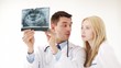 two doctors with x-ray prints