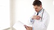 Video: male doctor making a prescription male doctor making a prescription