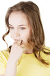 Woman putting her finger in her mouth