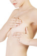 Caucasian adult woman examining her breast
