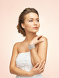 woman with pearl earrings and bracelet