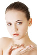 Beautiful woman's face with fresh clean skin