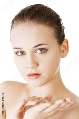 Photo: Beautiful woman's face with fresh clean skin Beautiful woman's face with fresh clean skin