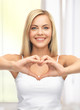 woman showing heart shape