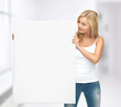 woman with white blank board