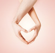 woman and man hands showing heart shape