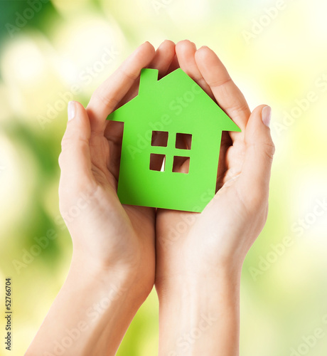 Photo: hands holding green house hands holding green house