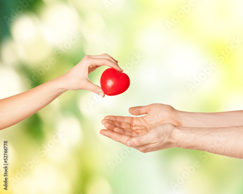 Photo: woman and man hands with heart woman and man hands with heart