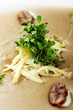 Fresh puree soup with cheese and green