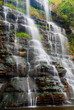 cool cascade in the forest in autumn