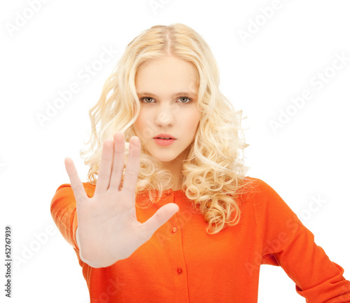 Photo: girl making stop gesture girl making stop gesture