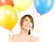 happy girl with colorful balloons