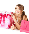 girl with colorful gift bags