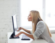 happy woman with laptop computer
