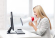 Photo: strict businesswoman shouting in megaphone strict businesswoman shouting in megaphone