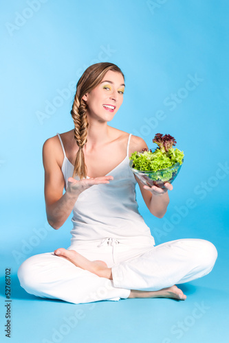 Photo: Healthy nutrition - young woman with salad Healthy nutrition - young woman with salad