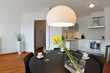 Modern living room interior with kitchen