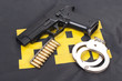 fbi concept with gun ammo and handcuffs