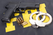fbi concept with gun ammo and handcuffs