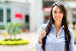 Business woman with thumbs up