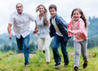 Photo: Family having fun outdoors Family having fun outdoors