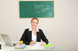 Portrait of teacher woman working in classroom