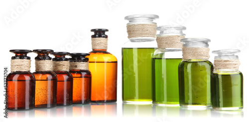 Photo: Medicine bottles isolated on white Medicine bottles isolated on white