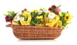 Beautiful spring flowers in basket isolated on white