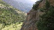 female climber climbing mountain
