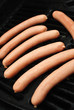 Raw Hot Dogs on a Summer Grill