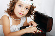 beautiful little girl plays