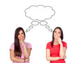 Two pensive brunette girls
