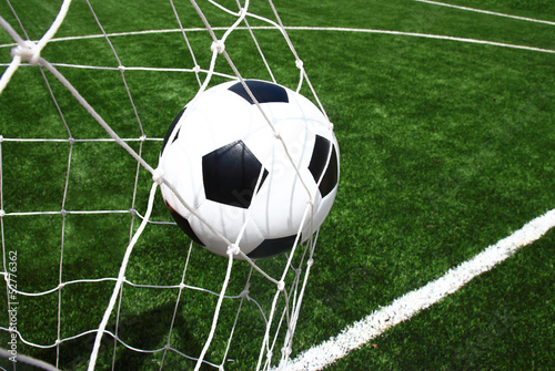 Photo: soccer ball in goal soccer ball in goal