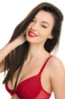 Attractive girl with a sexy cleavage in red bra smiling