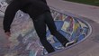Skateboarder Grinds Around Bowl