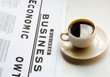 Photo: Coffee cup and newspaper Coffee cup and newspaper