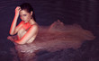 Photo: fashion woman in a pool fashion woman in a pool