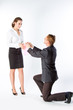 man gives a young and beautiful woman a gift