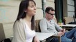 Sad couple sitting in the cafe, steadicam shot