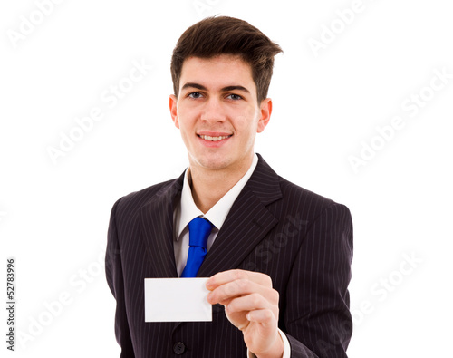 Photo: Young businessman with business card on white background Young businessman with business card on white background