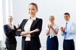 Four businesswomen standing in row