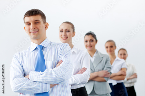 Photo: Group of business people standing in row Group of business people standing in row