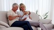 Video: Mature women using tablet pc on the couch Mature women using tablet pc on the couch