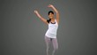 Fit brunette dancing and smiling