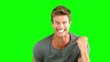 Attractive man gesturing and showing his happiness