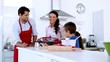 Mother bringing freshly baked cookies to family