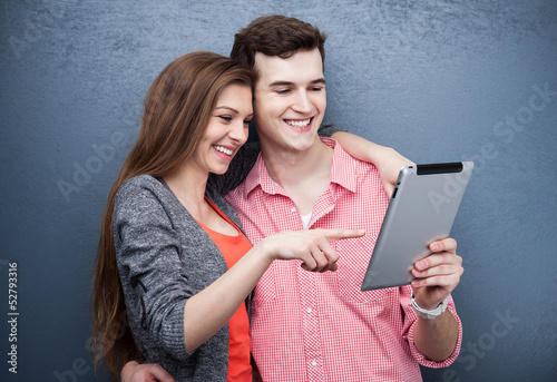 Photo: Young people with digital tablet Young people with digital tablet