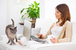 Young woman take a coffee and working at home