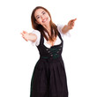 attraktive junge Frau im Dirndl bei freudiger Begrüßung
