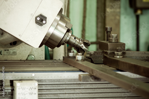Photo: CNC drilling and miling in a workshop CNC drilling and miling in a workshop